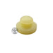 A pale yellow translucent plastic cap or plug with a rounded top and flat base, shown on a plain white background with a circular 'Fast Speed Parts' watermark on the left.