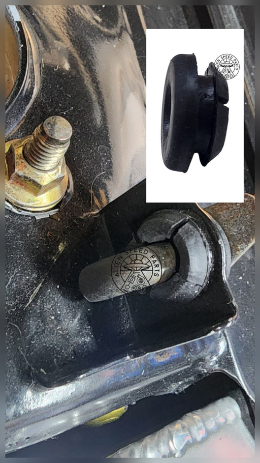 Close-up of mechanical components with a small inset showing a black rubber bushing. Bonnet rod bush